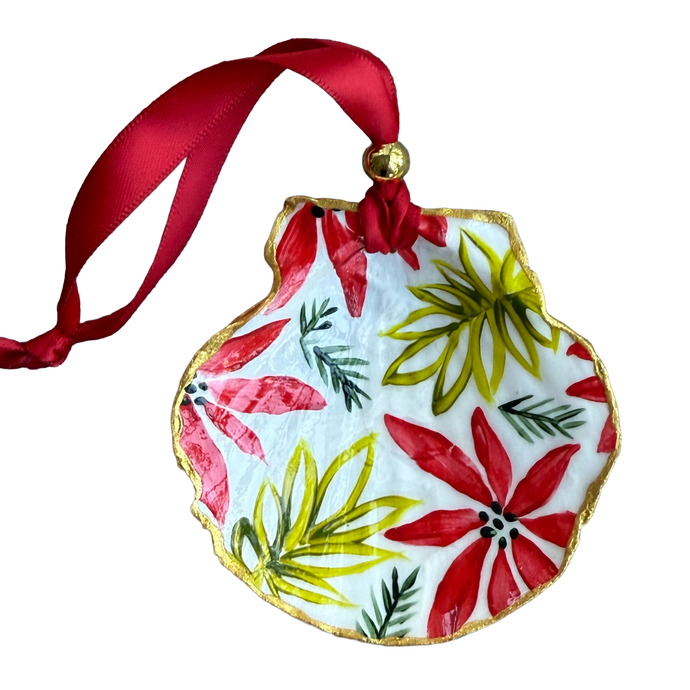 Decorative ornament with red and green floral design on a white background